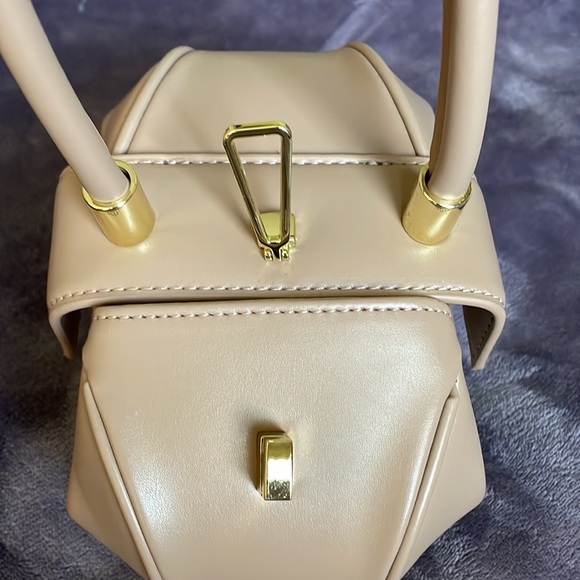 Beige small dumpling hobo bag I purchased brand new and never used. - Picture 8 of 11